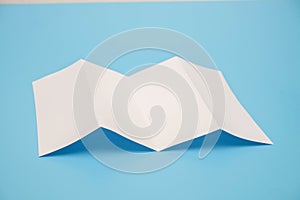 Template fold white paper on blue background