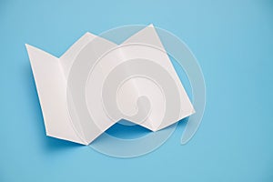 Template fold white paper on blue background