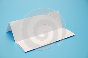 Template fold white paper on blue background