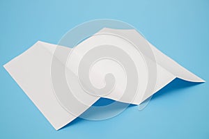 Template fold white paper on blue background