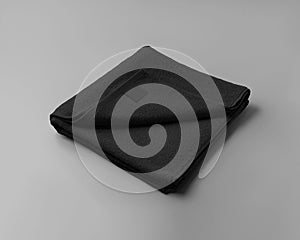 Template of folded black towel with label, for design, branding, isolated on background photo