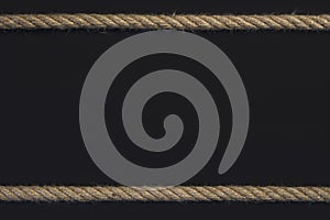 Template frame of cord rope on black background
