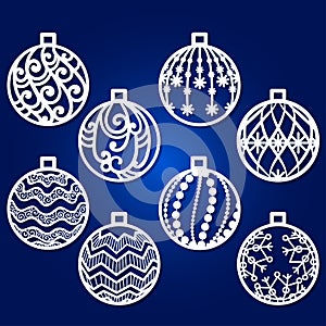 Template for laser cutting. A set of openwork Christmas tree decorations. Vector