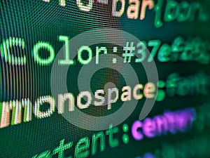 Template of website, selective focus. Developer display with source code. Programming code typing. Programmer working on computer