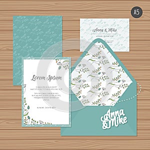 Template wedding invitation and envelope with floral ornament.