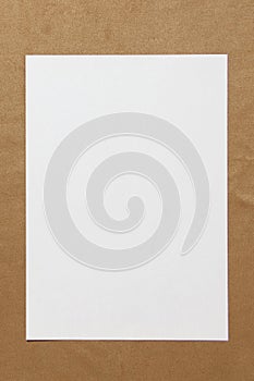 Template of white paper lies on light brown cloth background. Concept of business plan and strategy. Stock photo with