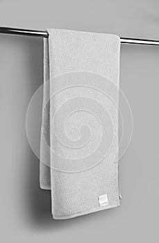 Template of white terry towel on towelling, shaggy fabric with label for advertising, branding, isolated on background with photo