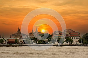 Temple  against the sky on a sunset, wat phra kaew, bangkok, thailand. Grand palace and Wat phra keaw at sunset bangkok.