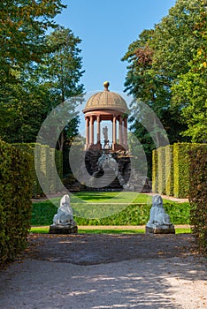 Temple of Apollo at gardens of Schwetzingen palace in Germany during sunny summer day