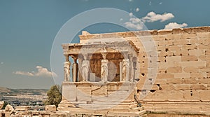 Temple of Athena Nike - Erechtheum located on the Acropolis area in a sunny day in the capital of Greece - Athens - travel