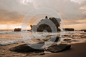 Tanah Lot Temple. Tanah Lot water temple in Bali during sunset. Famous hindu temple main Bali landmark. Indonesia