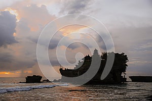 Tanah Lot Temple. Tanah Lot water temple in Bali during sunset. Famous hindu temple main Bali landmark. Indonesia