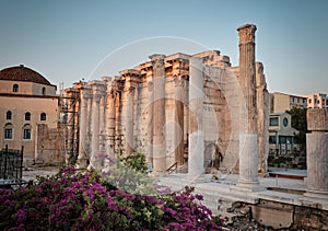 Temple and columns in the ancient area of Monastiraki near Acropolis at sunset in the capital Greece - Athens
