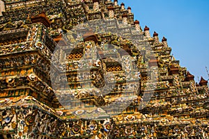 The Temple of Dawn Wat Arun and a beautiful blue sky in Bangkok, Thailand