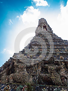 The Temple of Dawn Wat Arun and blue sky in Bangkok, Thailand