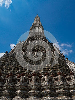 The Temple of Dawn Wat Arun and blue sky in Bangkok, Thailand