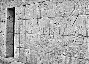 Temple of Dendur wall of heiroglyphic writing with dark doorway