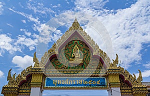 Temple doors in blue sky