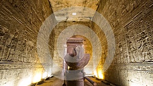 Temple of Edfu Horus Egypt interior hieroglyphics room with statue and monument uplight archietcture