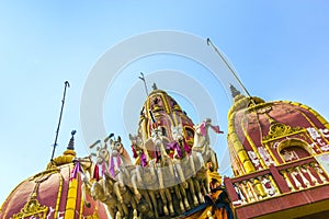 Temple entrance presided by a statue of Surya