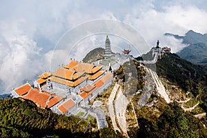 The Temple on Fansipan mountain peak the highest mountain in Indochina in Sapa city, Vietnam photo