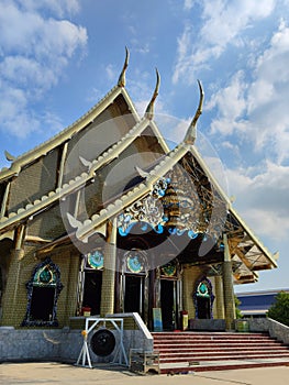 Temple with glass decorated roof in Thailand.