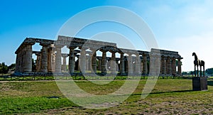 The temple of Hera and Paladino`s `Sand Horse` in Paestum photo