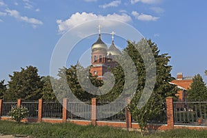 Temple of the Holy Great Martyr and Healer Panteleimon in the rays of the setting sun in the city of Slavyansk-on-Kuban, Krasnodar