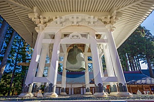 Temple house and bell on the sacred mountain Koyasan