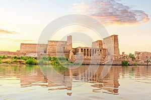 Temple of Isis on Philae Island at sunset, view from the Nile, Aswan, Egypt