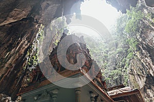 Temple with limestone cave texture inside Batu Caves near Kuala Lumpur, Malaysia.