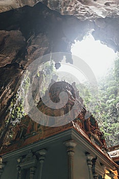 Temple with limestone cave texture inside Batu Caves near Kuala Lumpur, Malaysia.