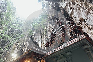 Temple with limestone cave texture inside Batu Caves near Kuala Lumpur, Malaysia.