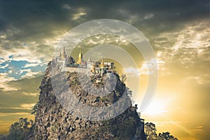 Temple near Mt. Popa in Myanmar at sunrise