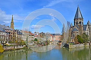 Temple Neuf meaning in French `New Temple` is a protestant church in Metz, France. It is surrounded by Moselle river