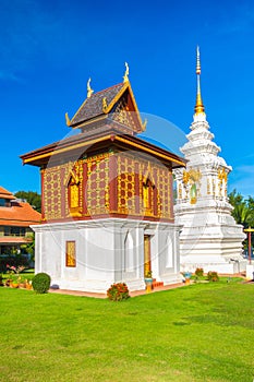 Temple in north of Thailand, the left is library of Buddhist Scriptures. Buddhist temple of Wat Huakuang