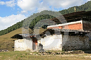 A temple is in ruins in the countryside near Gangtey, Bhutan