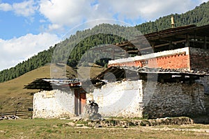 A temple is in ruins in the countryside near Gangtey, Bhutan photo