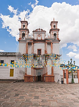 Temple of Santo Domingo de Guzman, in the Pueblo Magico of San Cristobal de las Casas, Chiapas, painted white with orange photo