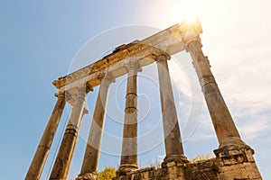 Temple of Saturn on Roman Forum on sky background, Rome, Italy, Europe