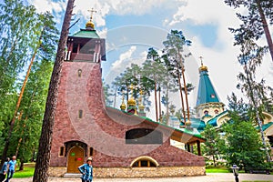 Temple of St. Seraphim of Sarov in the monastery in honor of the holy royal martyrs `Ganina Yama` on a summer sunny day