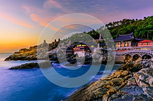 Temple and sunrise in Busan city in South Korea.