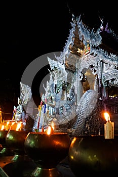 Temple Wat Si Supan silver temple vertical night photo