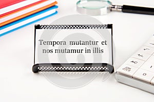 Tempora mutantur et nos mutamur in illis Translated from Latin, it means Times are changing, photo