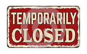 Temporarily closed vintage rusty metal sign