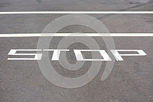 Temporarily STOP warning traffic sign painted on street surface