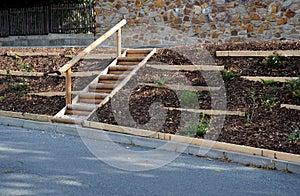 Temporary covering of the lawn sowing with textiles to ensure a large slope against erosion. using brown jute fabric stabilizing c