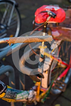 Temporary handle on the handlebar of a worn bike photo