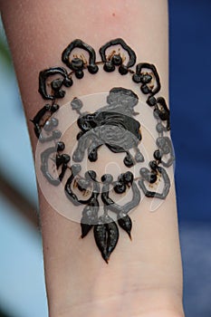 Temporary tattoo in henna,