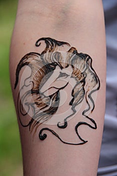 Temporary tattoo in henna,